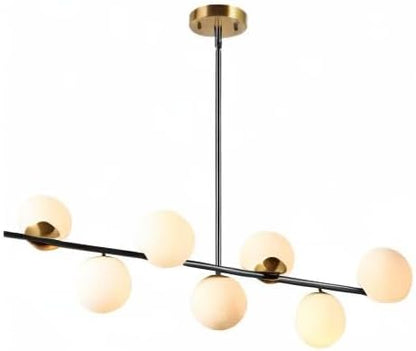 Modern chandelier with glass globe lights on a white background