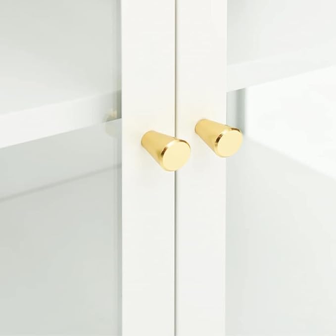 Gold cabinet knobs on a white cabinet