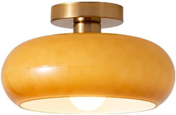 Gold ceiling light fixture on a white background