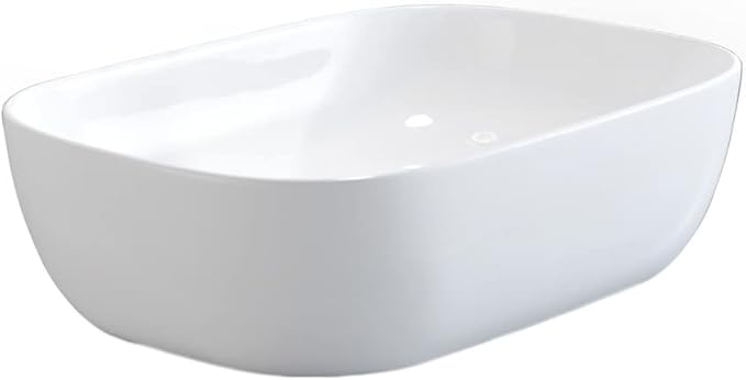 White ceramic sink on a white background