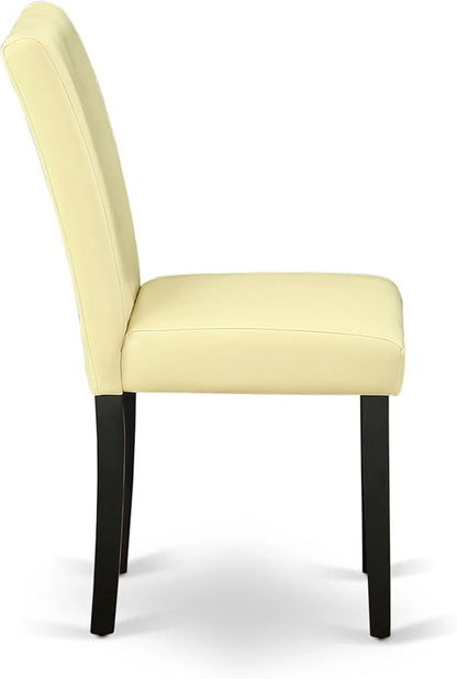East West Furniture ABP1T73 Abbott Parson Dining Room Chairs - Eggnog Faux Leather Upholstered Chairs, Set of 2, Black