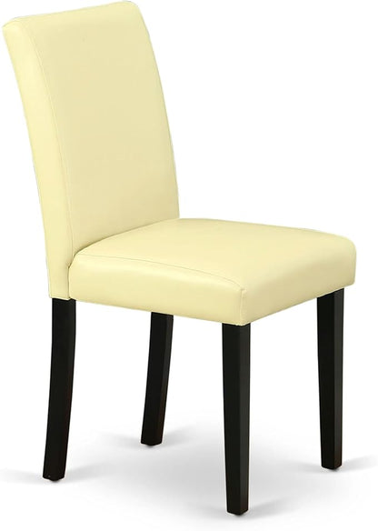 East West Furniture ABP1T73 Abbott Parson Dining Room Chairs - Eggnog Faux Leather Upholstered Chairs, Set of 2, Black