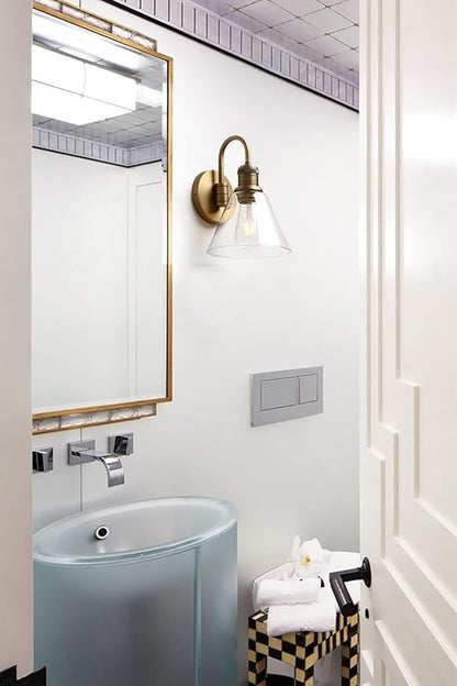 Yosoan 1-Light Brass Modern Vintage Indoor Wall Sconce, Vanity Single Luxury Hardwired Retro Textured Clear Funnel Flared Glass Shade with Industrial Curved Rod Bathroom Lamp(Antique)