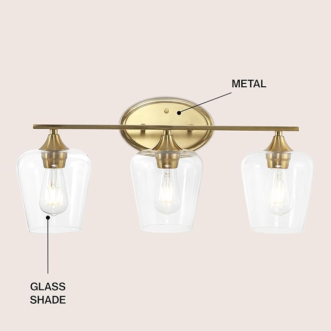 JONATHAN Y 23" Brass Gold 3-Light Farmhouse Rustic LED Vanity Light Sconce, Clear Glass Shade, Vintage Indoor Fixture for Bathroom Mirror, LED Bulb Included (JYL7547B)