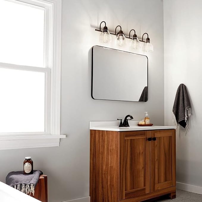 Kichler Avery 4-Light Bathroom Vanity Light Fixture with Clear Seeded Glass, Modern Farmhouse Industrial Style in Natural Brass, 300 Total Watts (33.5" x 9.5" x 8.25"), 45974NBR
