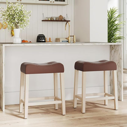 Giantex 24" Bar Stools Set of 4, Upholstered Counter Height Saddle Bar Stools with Footrest and Wood Legs, Farmhouse Faux Leather Backless Barstools for Kitchen Island, Dining Room, Cafe, Brown+Beige