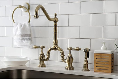 Kingston Brass KS7753TALBS Tudor Bridge Kitchen Faucet with Brass Sprayer, Antique Brass