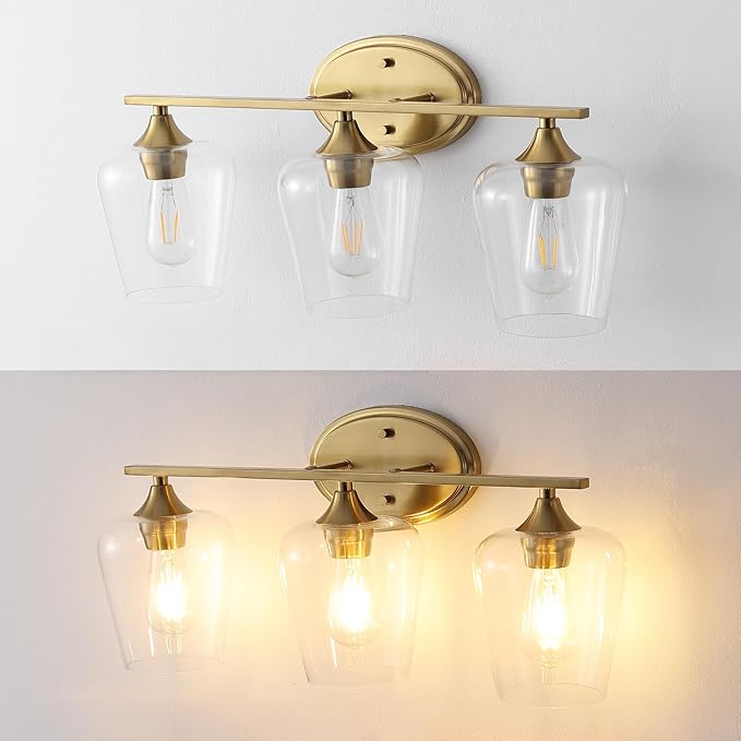 JONATHAN Y 23" Brass Gold 3-Light Farmhouse Rustic LED Vanity Light Sconce, Clear Glass Shade, Vintage Indoor Fixture for Bathroom Mirror, LED Bulb Included (JYL7547B)