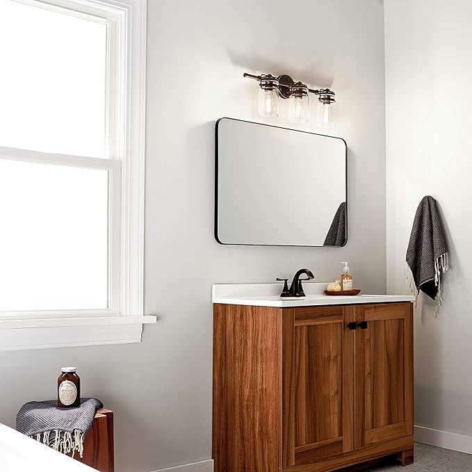 KICHLER Brinley 24" 3 Light Vanity Light with Clear Glass in Olde Bronze®